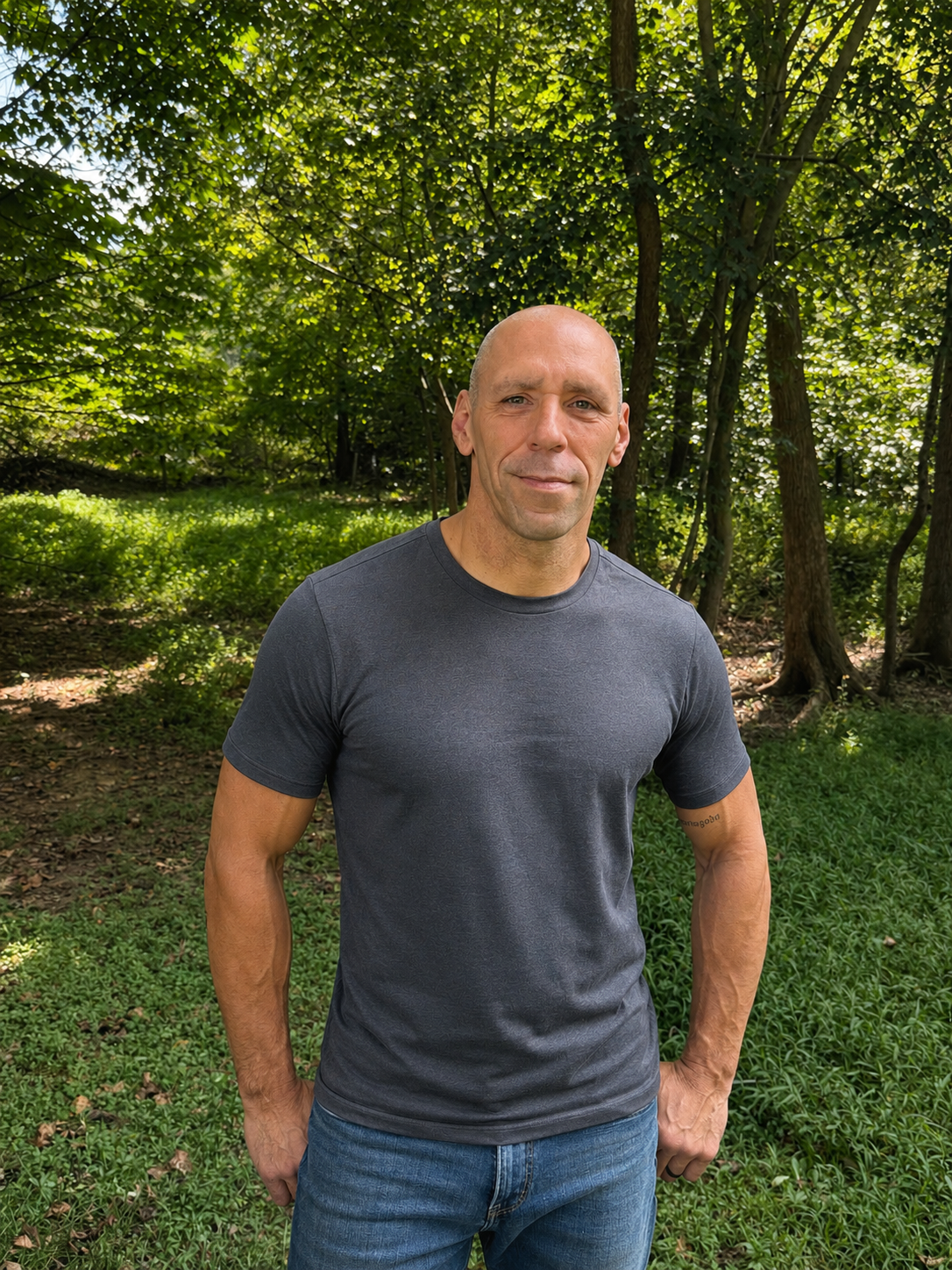 Scott Burgess, founder of Rhizomatic Gardens, in the forest